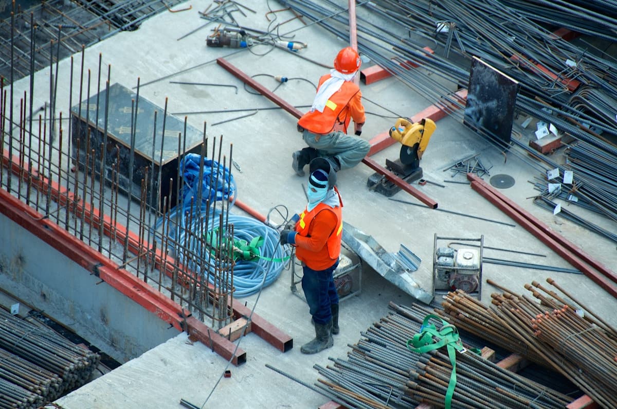 Industrial construction team reviewing project work